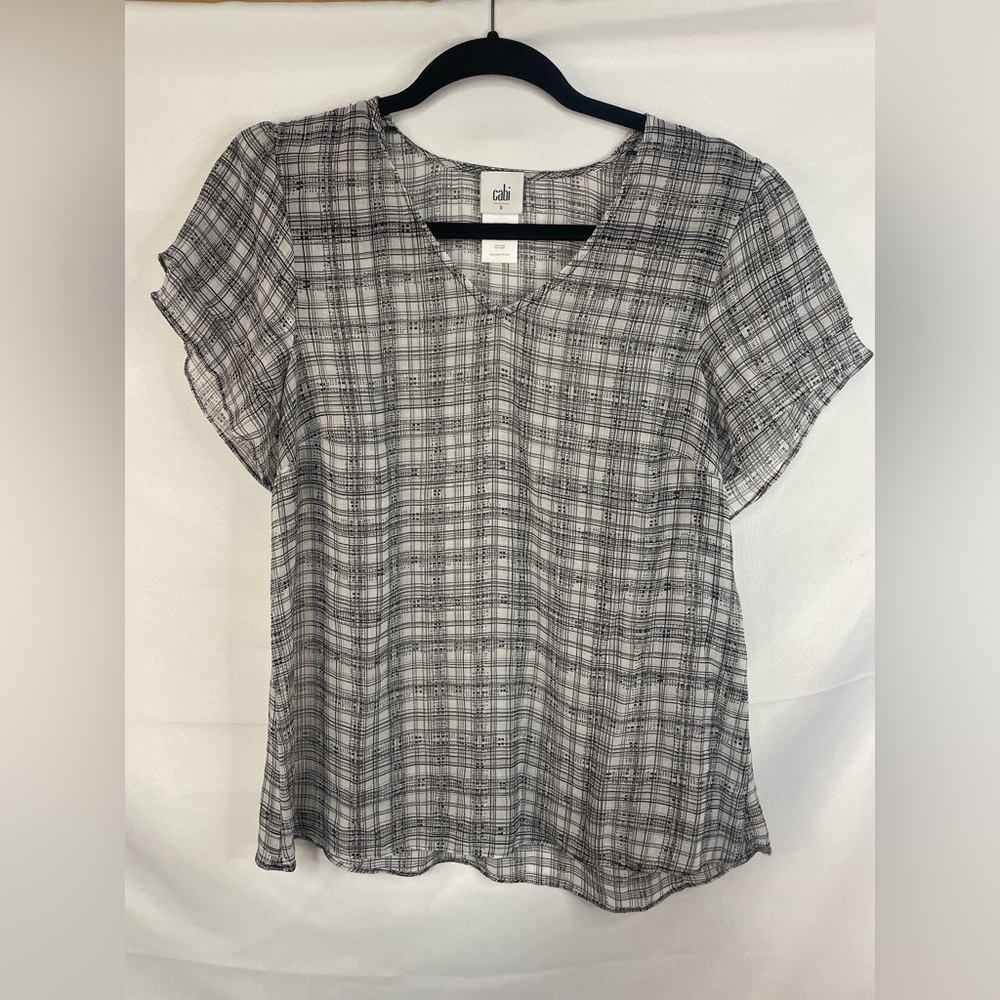 Cabi black and white plaid sheer blouse with layered flutter sleeves.